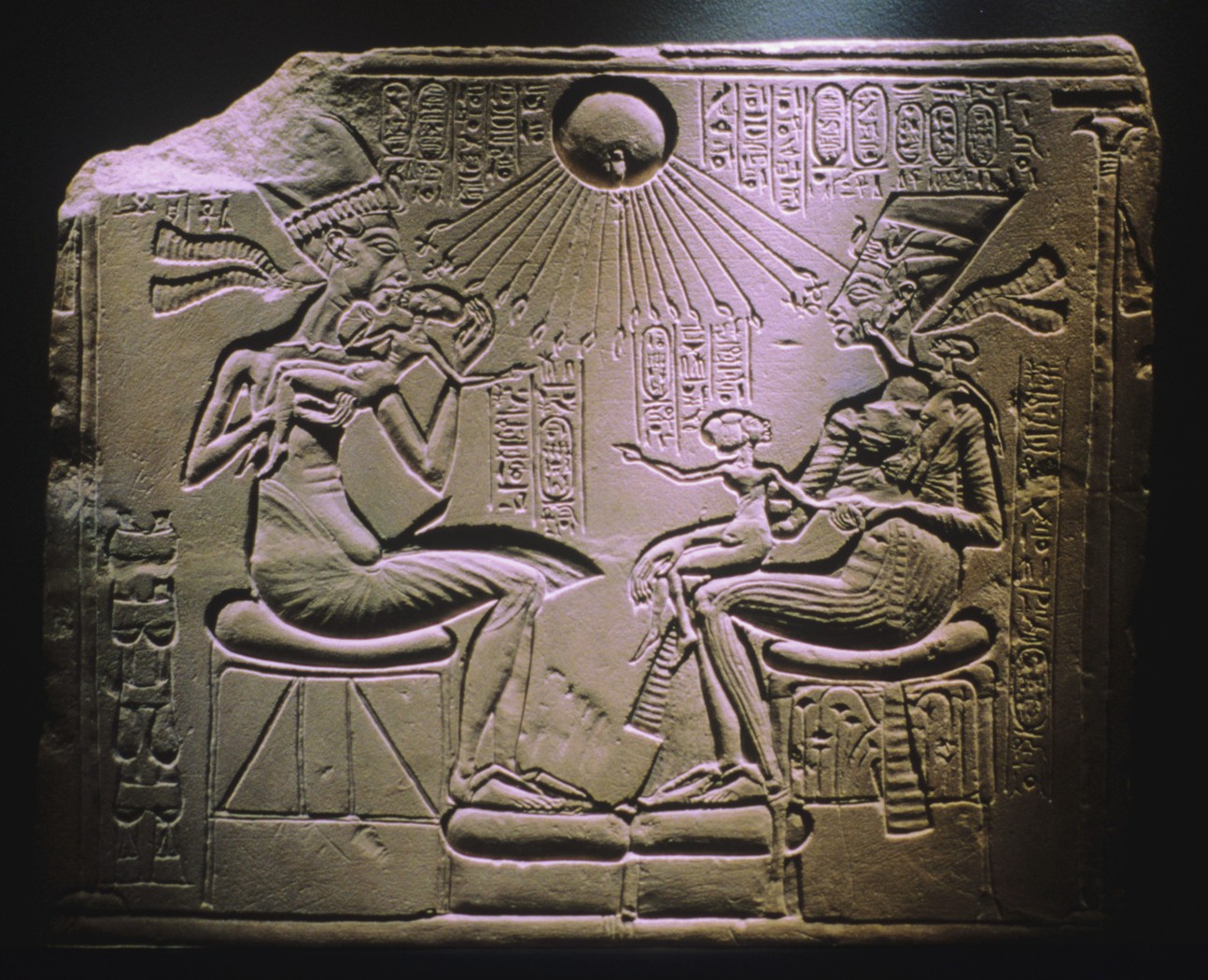 Figure 6-4: Akhenaten’s family portrait brings the royal family down to earth while linking them to the god Aten.